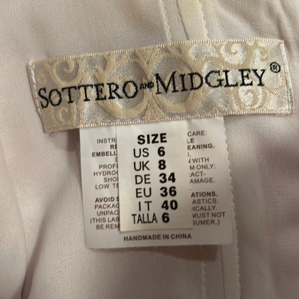 Sottero Midgley wedding dress. Not worn beautiful long ivory / soft nude dress.